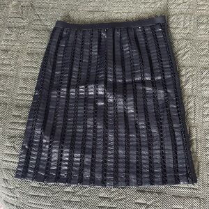 Stretchy faux-leather and lace black skirt. So unique!